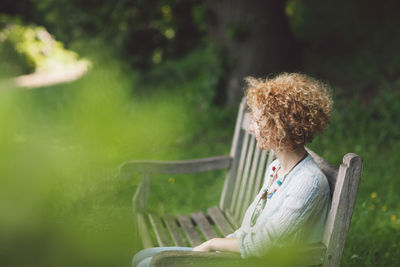 Woman sitting in park