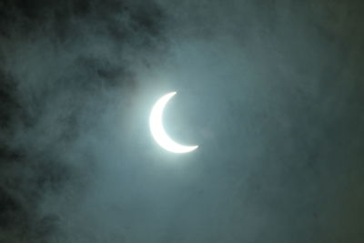 Low angle view of moon against sky at night