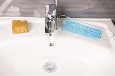 High angle view of faucet in bathroom