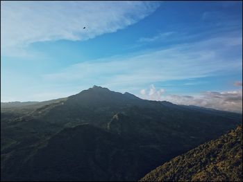 Scenic view of rocky mountains against sky