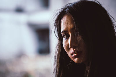 Close-up portrait of sad young woman