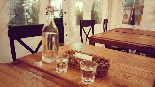 Empty wooden table in restaurant