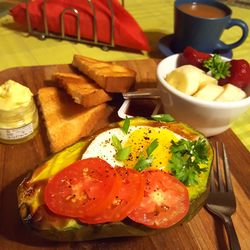 Close-up of breakfast served on table