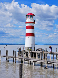 Red-white lighthouse on lake neusiedlersee in austria