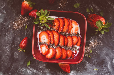 High angle view of strawberries on barbecue