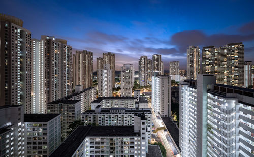 Modern residential buildings in city against sky