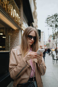 Young woman drinking coffee
