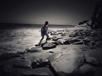 Woman standing on beach