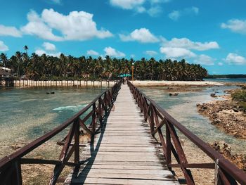 Pier over sea against sky