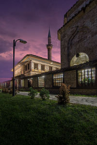 View of historic building against sky at sunset