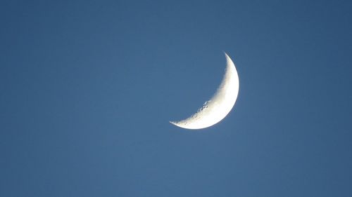 Low angle view of moon in sky