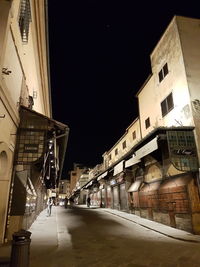 Buildings in city at night