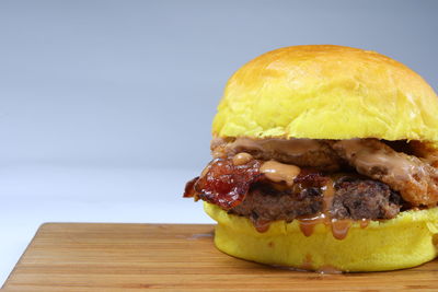 Close-up of burger on cutting board