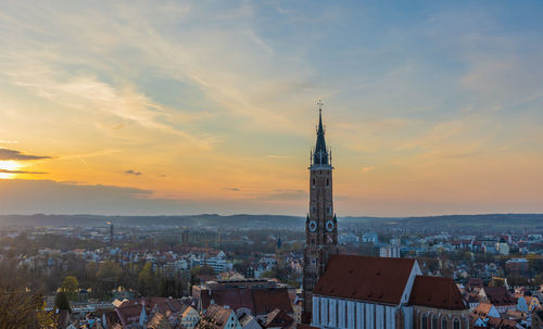 Cityscape against sky during sunset