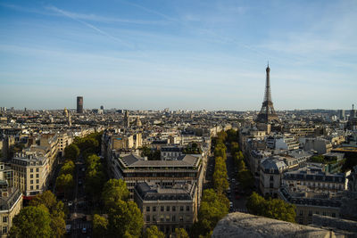 High angle view of city buildings against sky