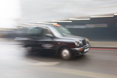 Cars moving on road in city