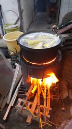 View of preparing food on barbecue grill