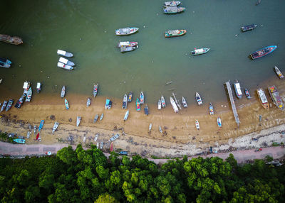 Aerial view of nautical vessels at beach