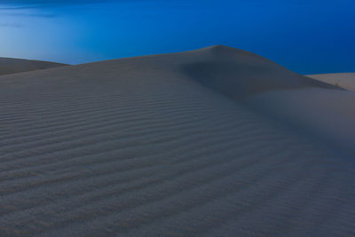 Sand dunes in desert
