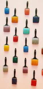 Multi colored umbrellas on wall