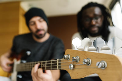 Men playing guitar