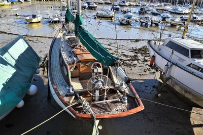 High angle view of fishing boats moored at harbor