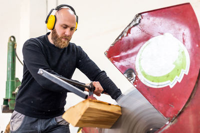 Portrait of man working in workshop