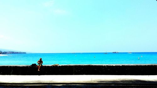 Scenic view of sea against clear sky