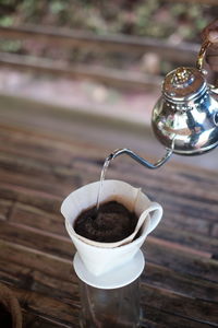 High angle view of coffee cup on table