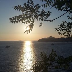 View of calm sea at sunset