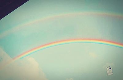 Rainbow over white background