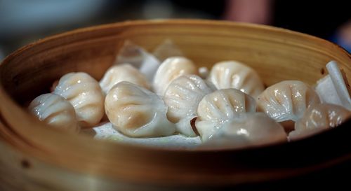 Close-up of chinese dumplings served in mushiki