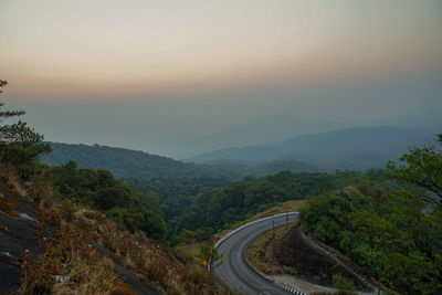 Scenic view of mountains against sky during sunset