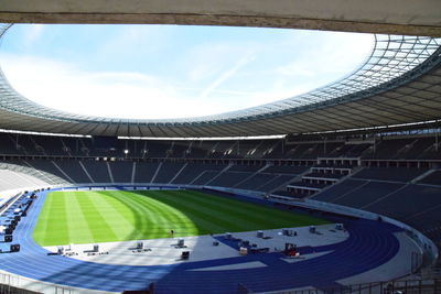 Low angle view of soccer field against sky