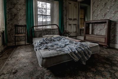 Bed in abandoned house