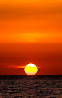 View of sea against romantic sky at sunset