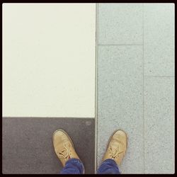 Low section of person standing on ground