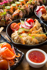 Close-up of seafood served in bowl on table