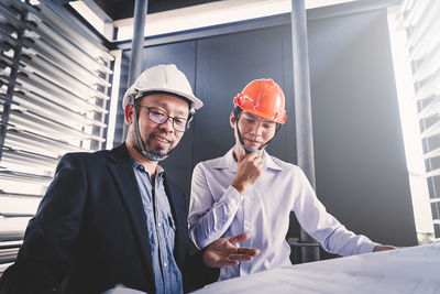 Man working in front of office