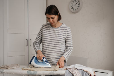 Portrait of young man working at home