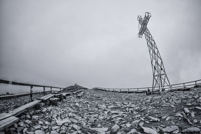 Fisheye view of cross against sky