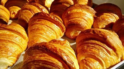 Close-up of croissants for sale in store