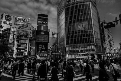 People walking on street in city