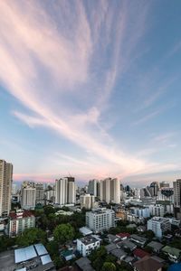 High angle view of buildings in city against sky