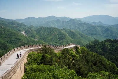 High angle view of trees and mountains against sky