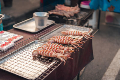 Close-up of seafood on barbecue grill