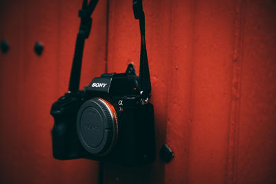 Close-up of camera on wall