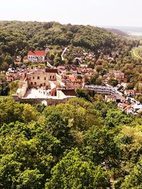 High angle view of townscape and trees in town