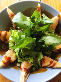 High angle view of vegetables in plate on table