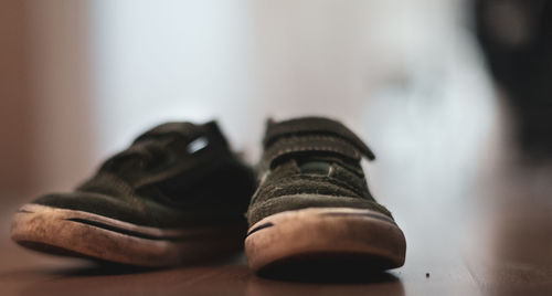 Close-up of shoes on floor